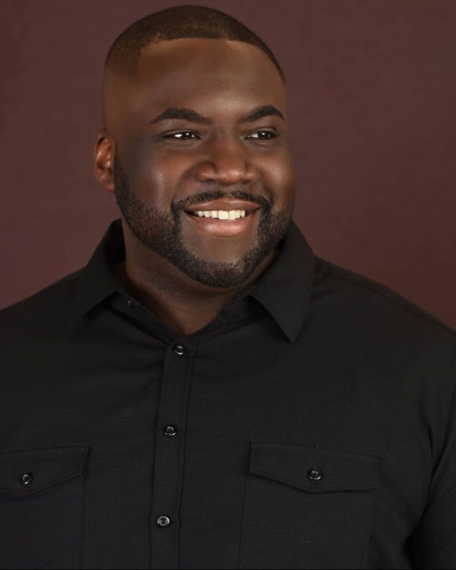 actor Adrian M. Mompoint large photo