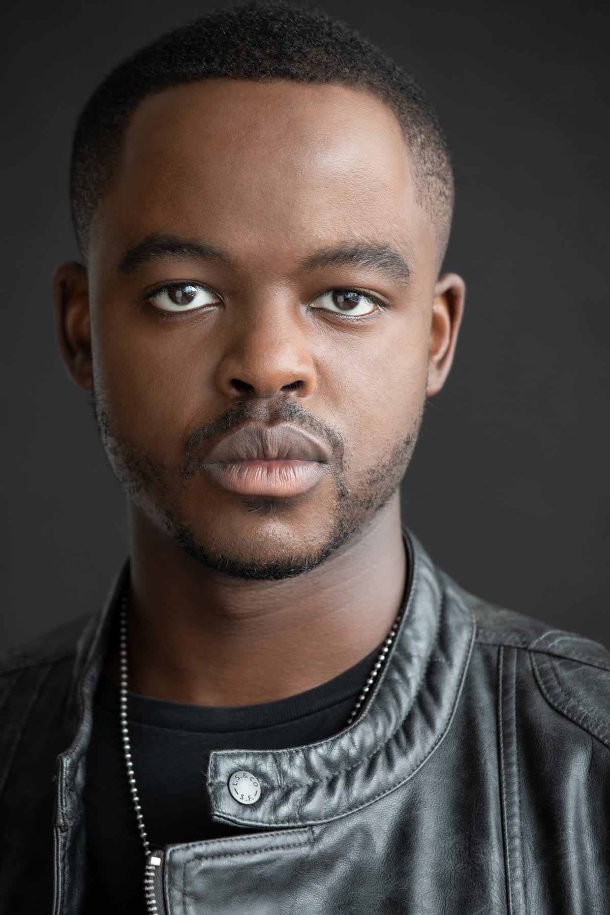 actor Andile Win large photo