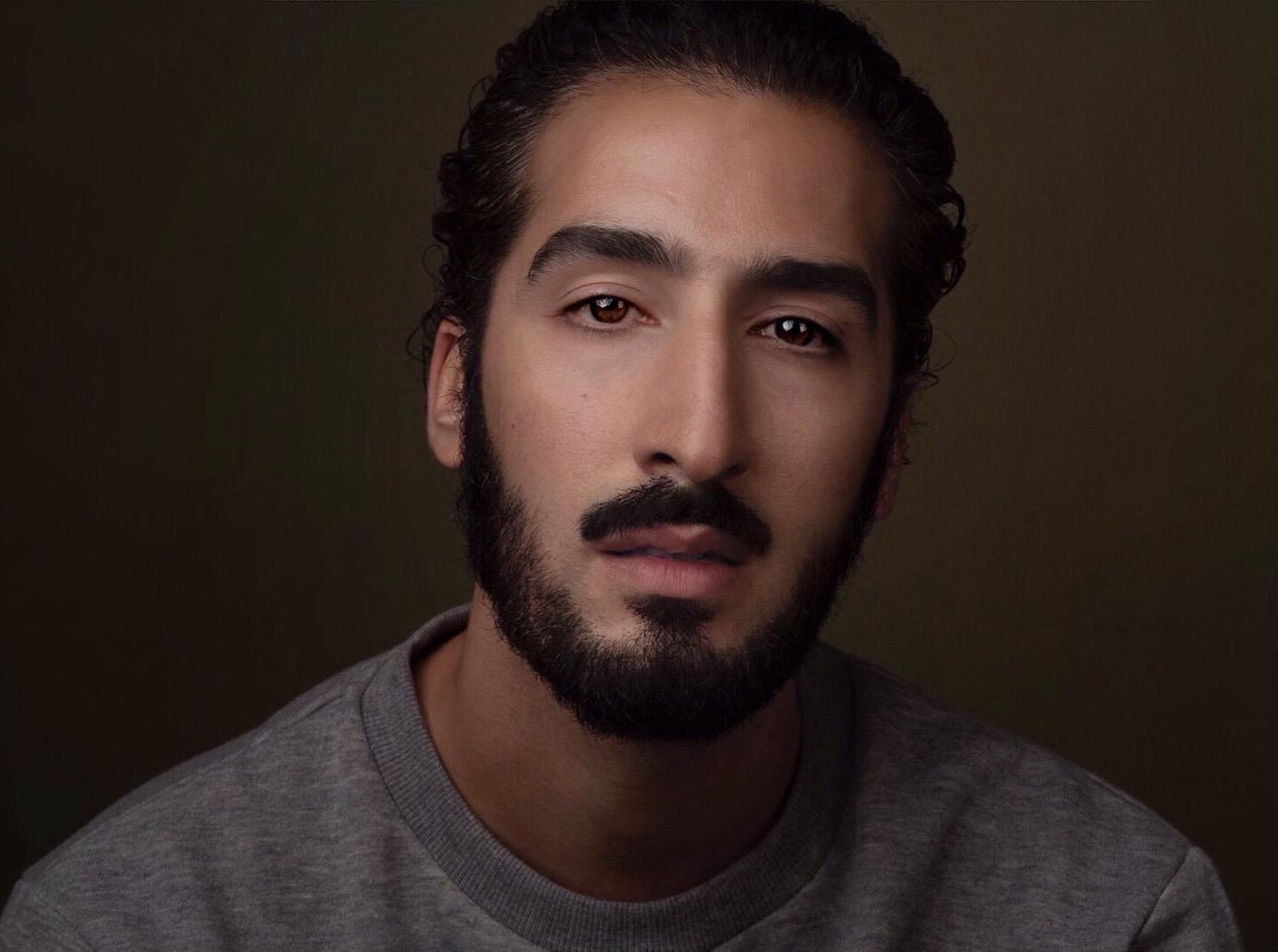 actor Tolga Safer large photo