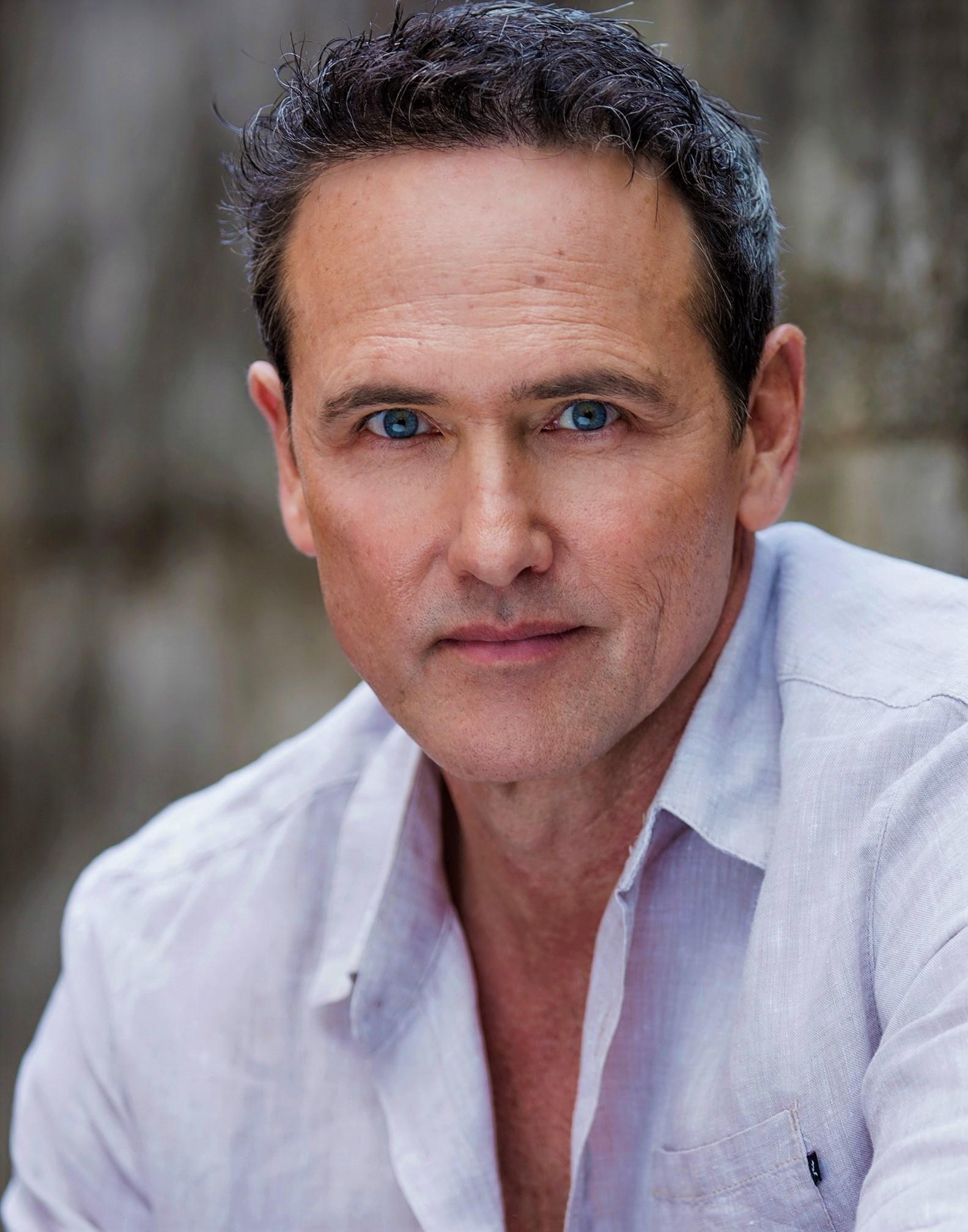 actor Victor Parascos large photo