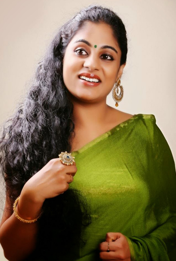 actor Asha Aravind large photo