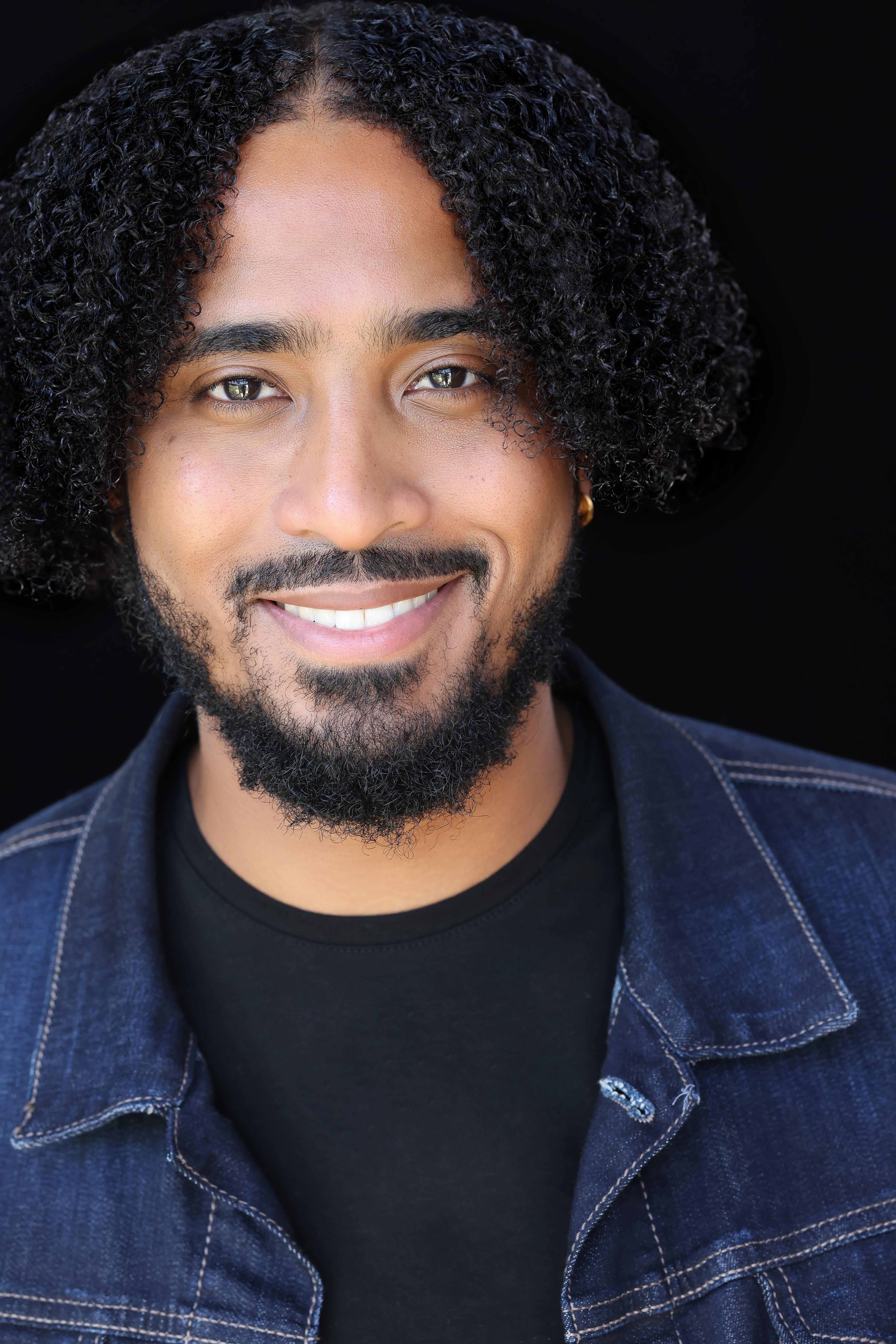 actor Reggie P. Louis large photo