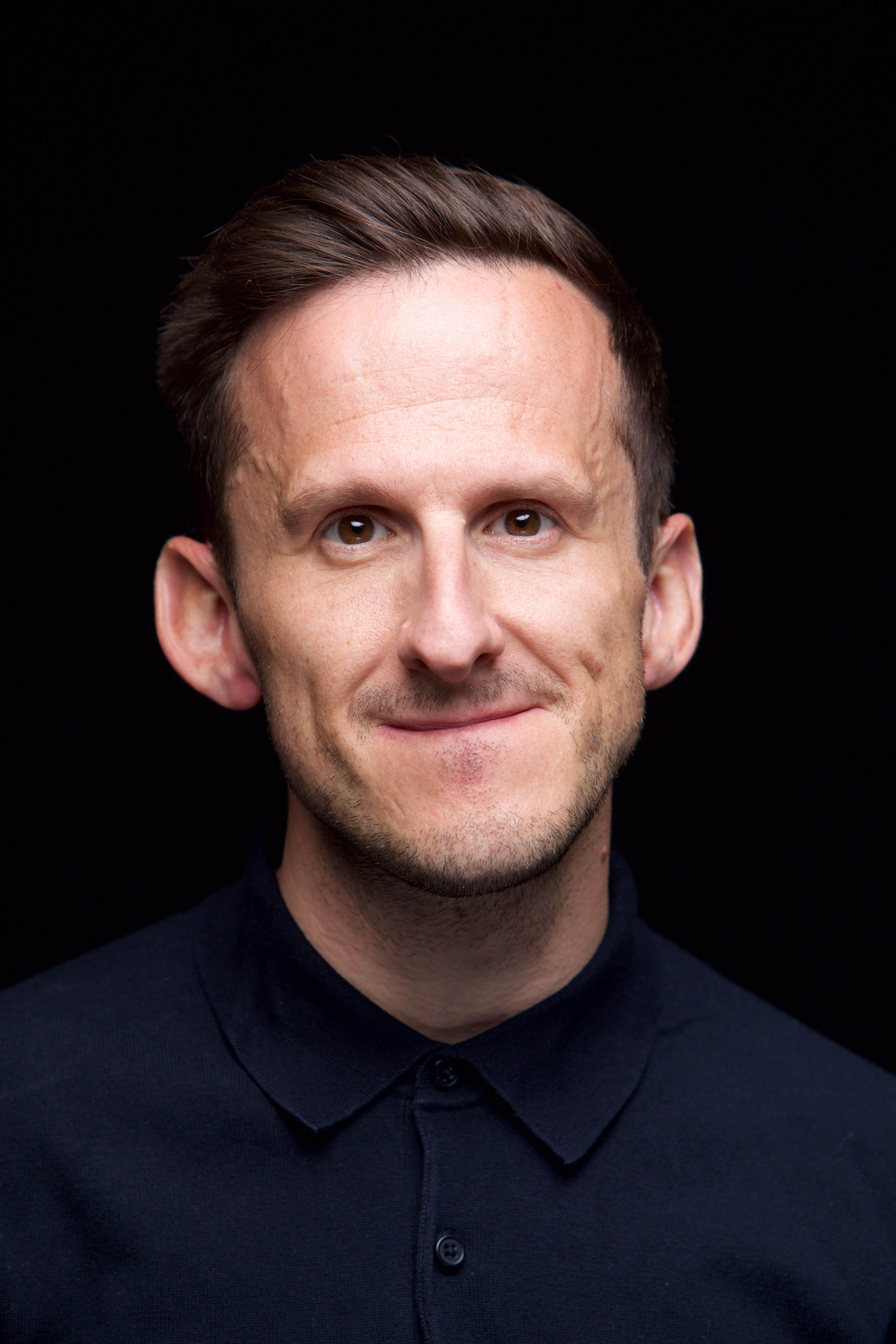 actor Adam Brown large photo