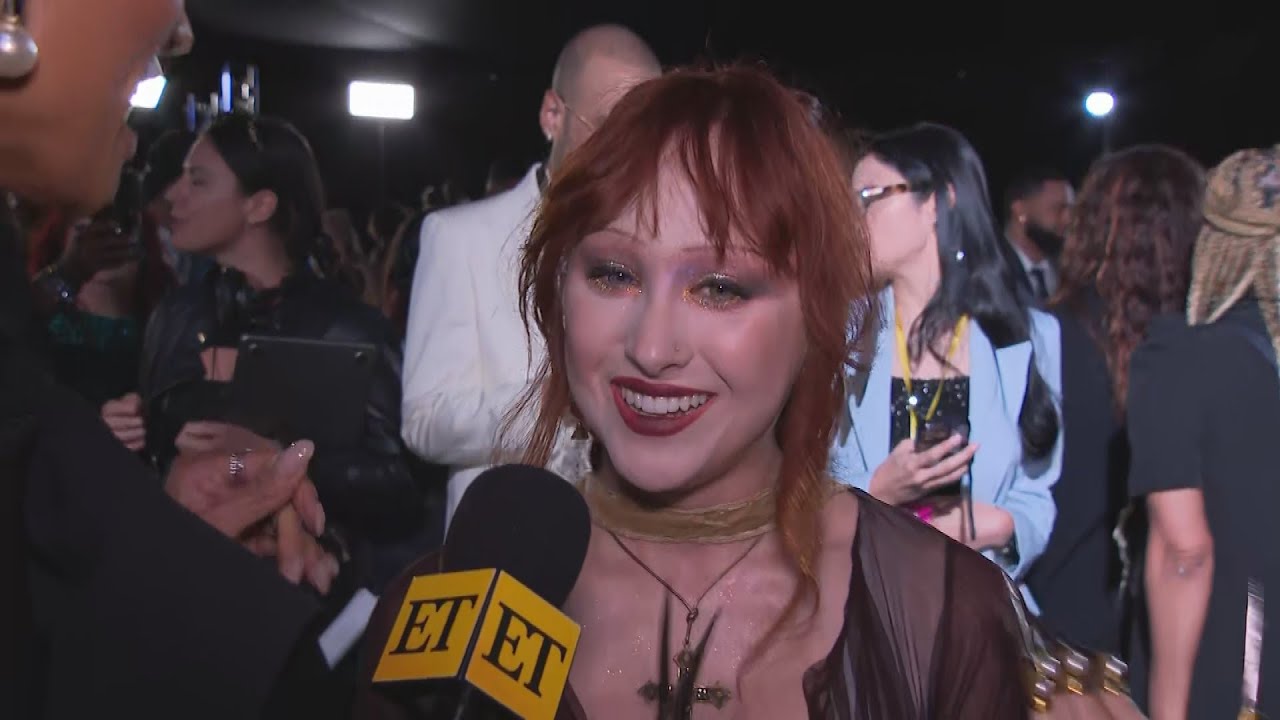 Why Chappell Roan YELLED at VMAs Photographers (Exclusive) backdrop