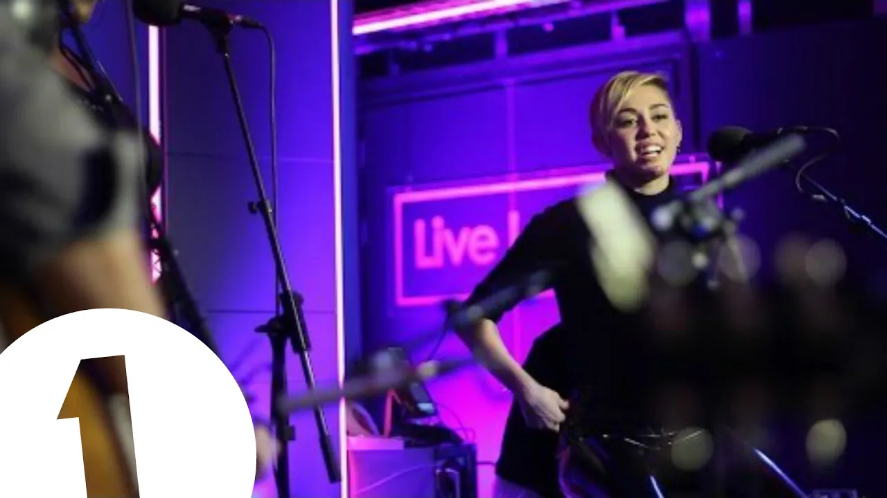 Miley Cyrus covers Summertime Sadness in the Live Lounge background