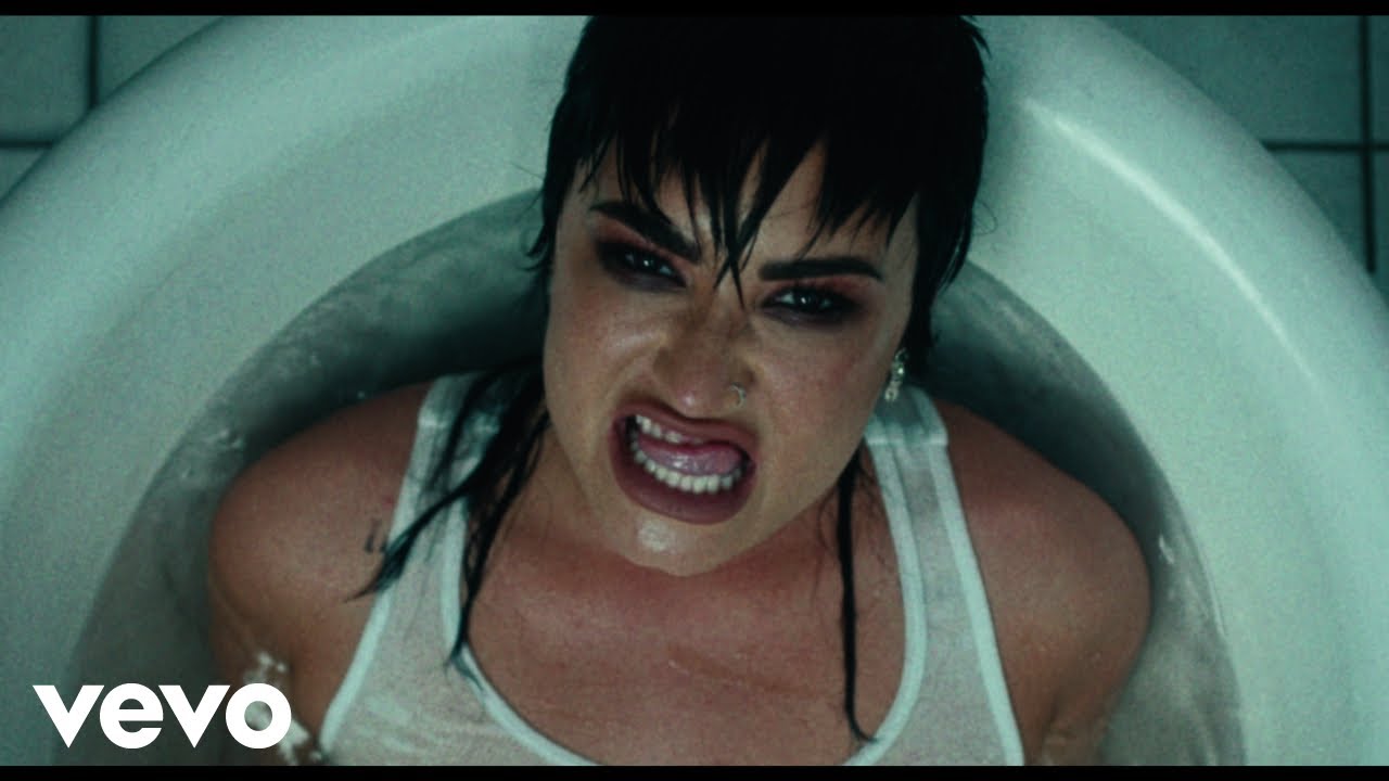 Demi Lovato - SKIN OF MY TEETH (Official Video) background