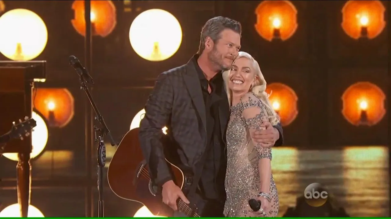 Blake Shelton and Gwen Stefani with Go Ahead And Break My Heart background