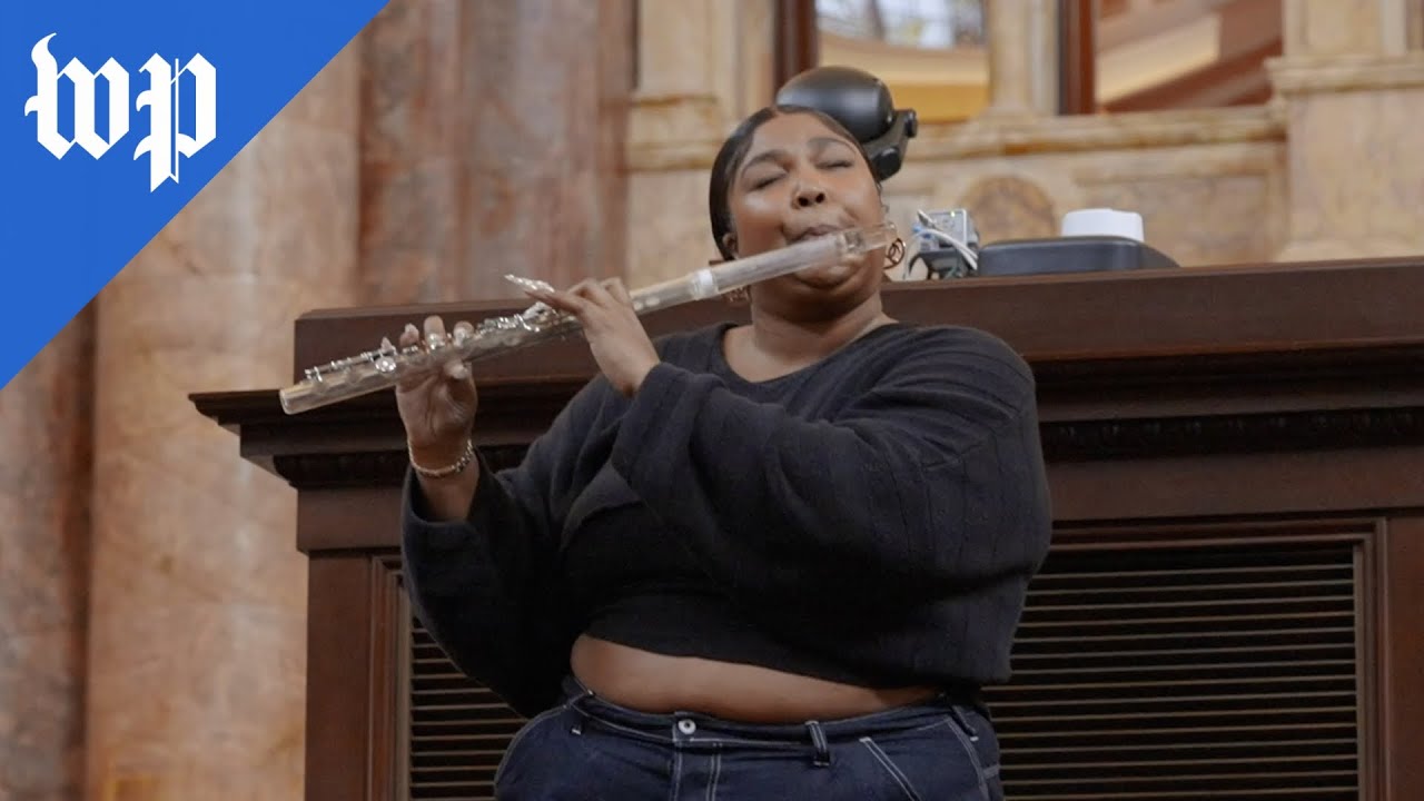 Lizzo plays James Madison's flute at Library of Congress background