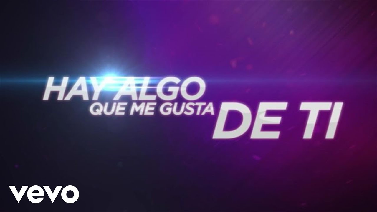 Algo Me Gusta De Ti (Lyric Video) background