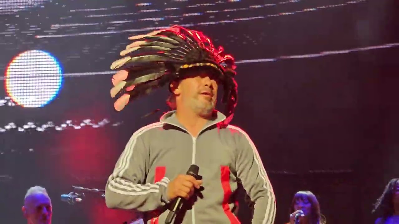 Jamiroquai - Cosmic Girl (Live Théâtre Antique d'Orange 2023) poster — similar to Jamiroquai - Full Concert - 07/23/99 - Woodstock 99 East Stage (OFFICIAL)