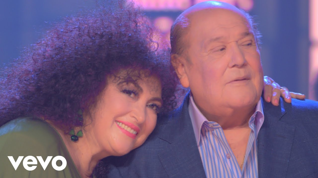 Leo Dan, Amanda Miguel - Ojos Azules (En Vivo) background
