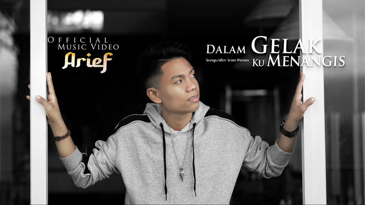 Arief - Dalam Gelak Ku Menangis (Official Music Video) background