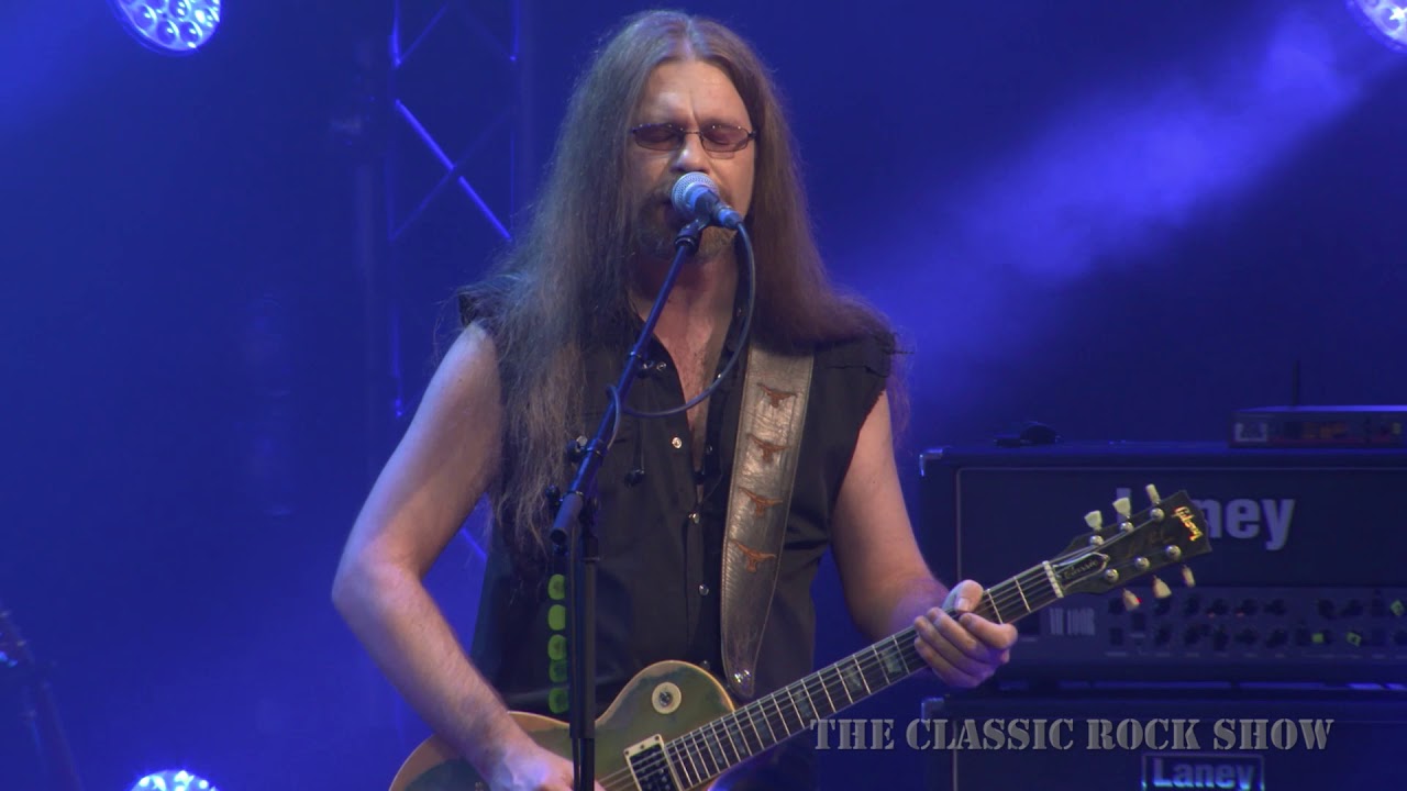 Dire Straits "Money For Nothing" performed by The Classic Rock Show background