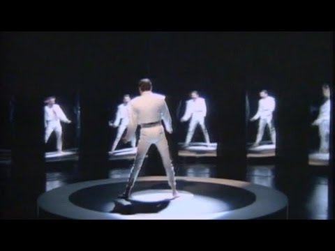 Queen - I Was Born To Love You (Official Video) background
