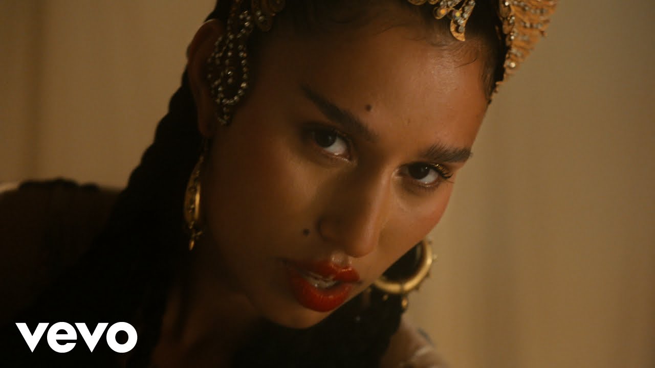 RAYE - Love Me Again (Official Video) background