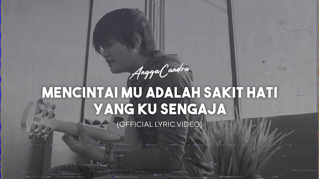 Angga Candra - Mencintaimu Adalah Sakit Hati yang Ku Sengaja (Official Lyric Video) backdrop