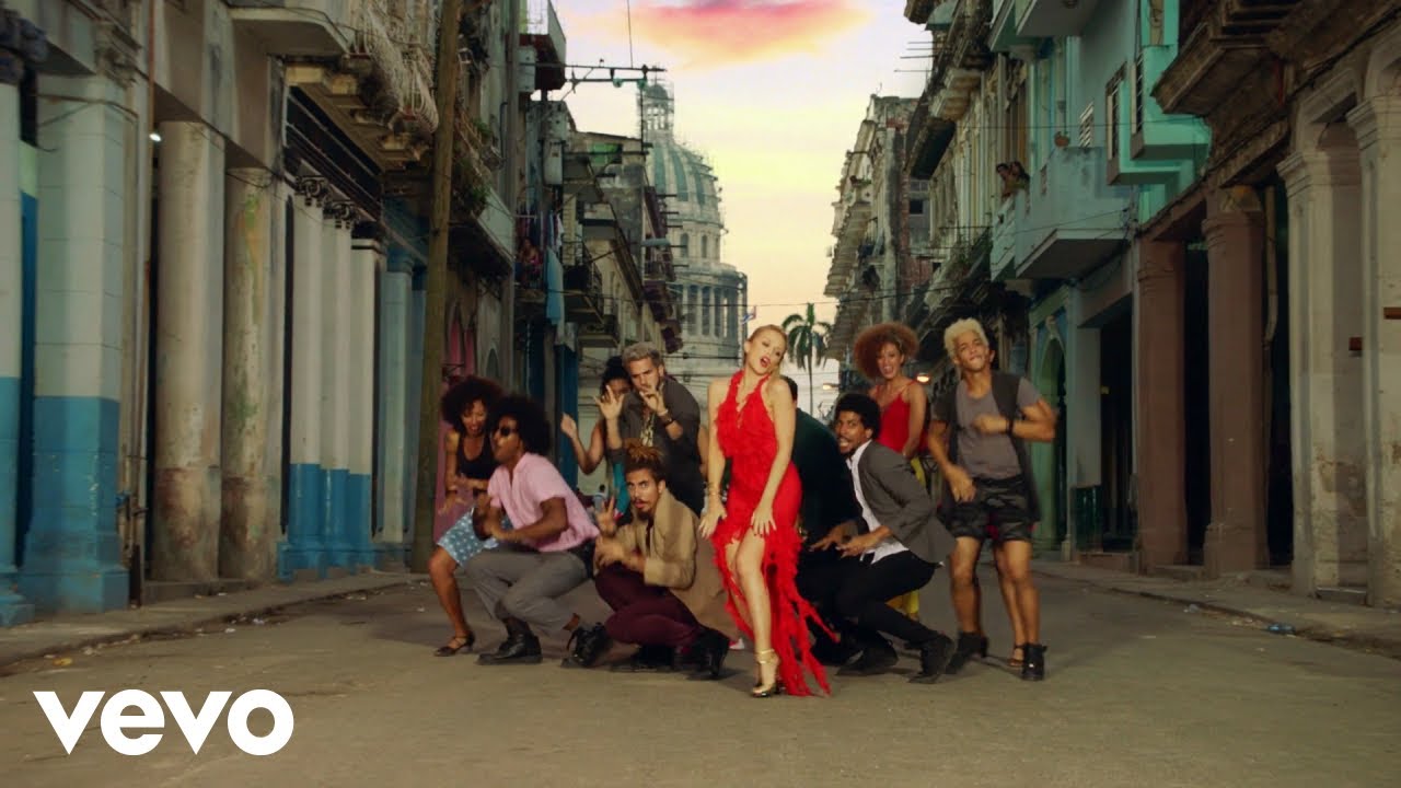 Kylie Minogue - Stop Me From Falling feat. Gente De Zona (Official Video) background