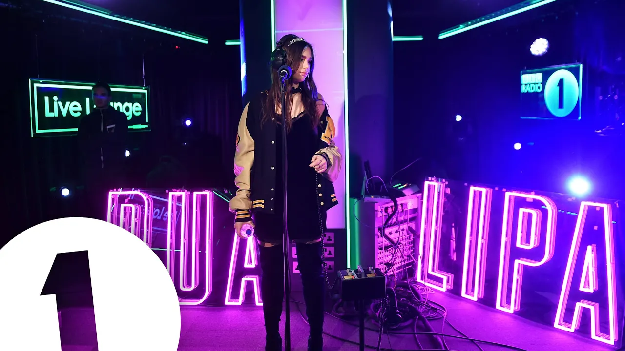 Dua Lipa covers the Weeknd's The Hills in the Live Lounge backdrop
