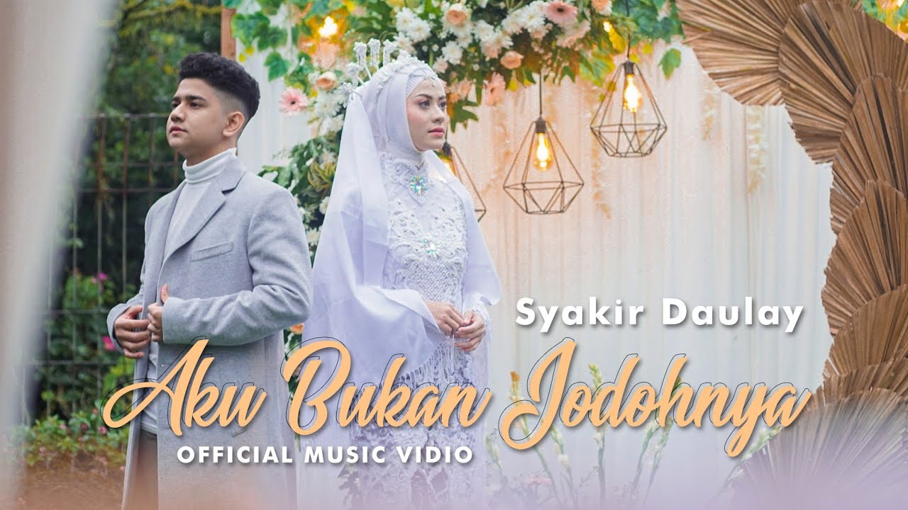 Syakir Daulay - Aku Bukan Jodohnya (Official Music Vidio) background