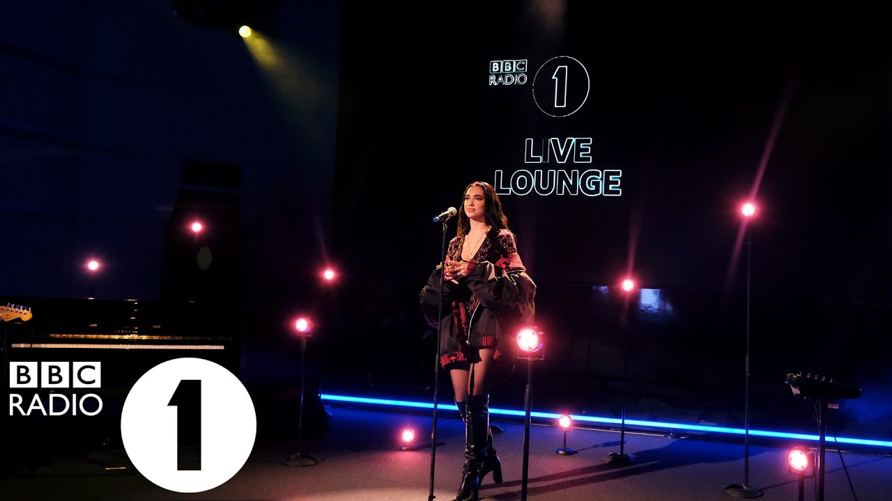Dua Lipa - We're Good in the Live Lounge background