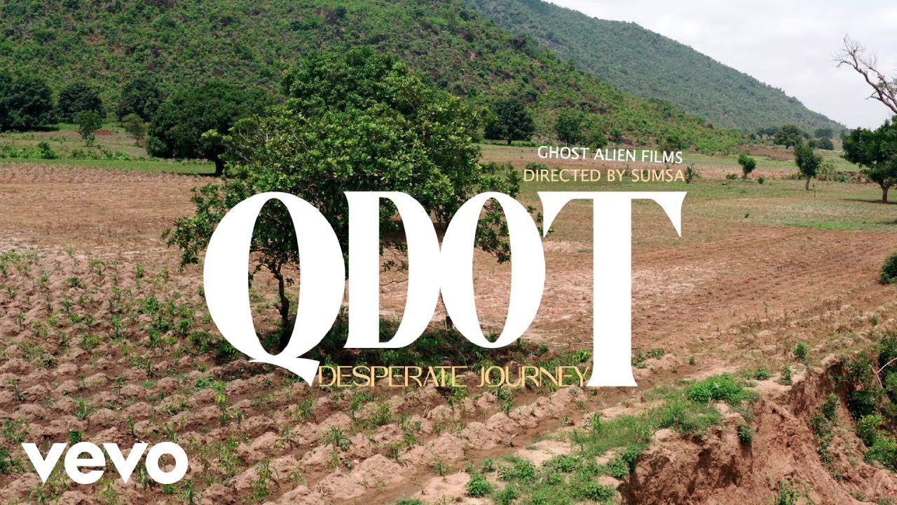 Qdot - DESPERATE JOURNEY (Official Video) background