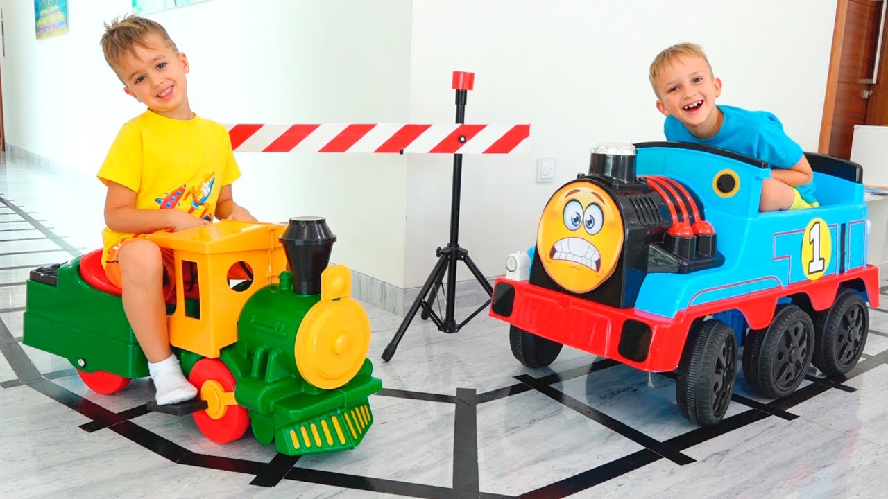 Vlad and Niki play with Toy Trains background