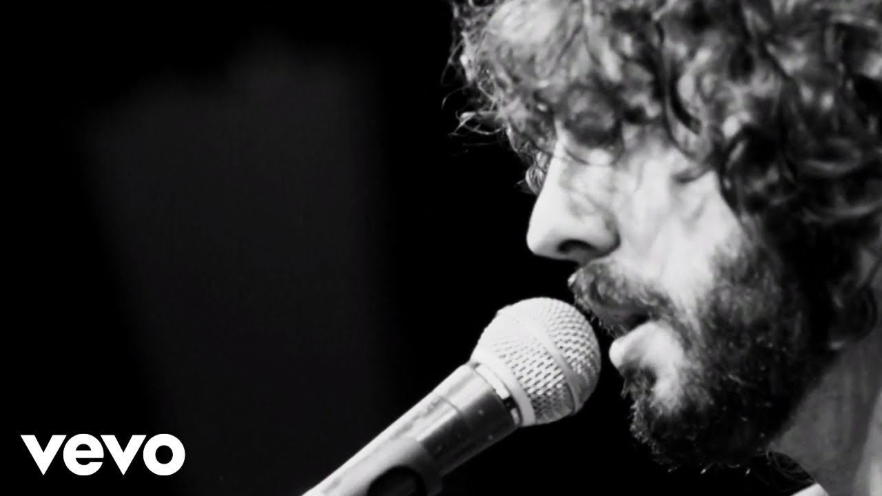 IZAL - La Mujer de Verde (En Directo) background