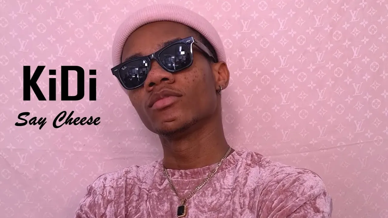 KiDi - Say Cheese (Official Home Video) background