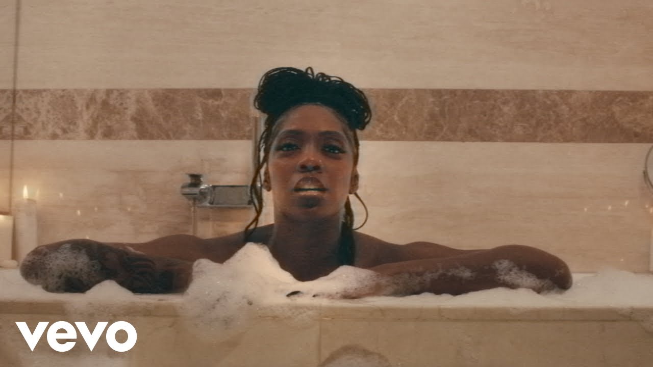 Tiwa Savage - Dangerous Love background
