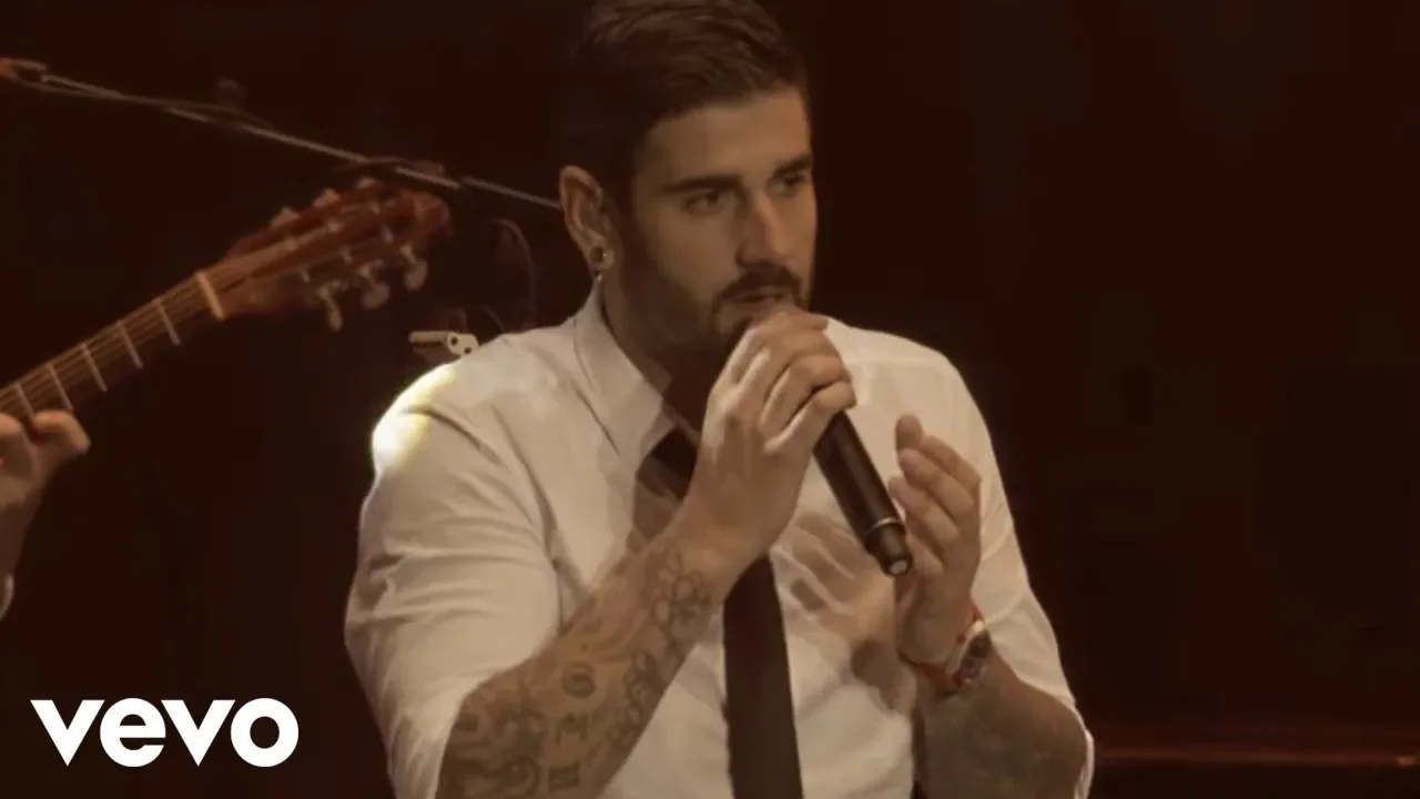 Melendi - El Amor Es un Arte (En Directo) background
