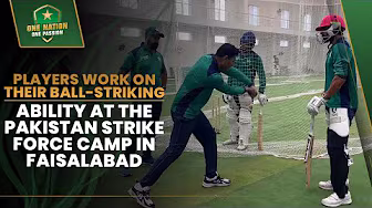 Players work on their ball-striking ability in the ongoing Pakistan Strike Force camp in Faisalabad. background