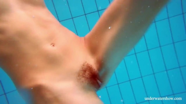 Beautiful ginger hairy pussy underwater