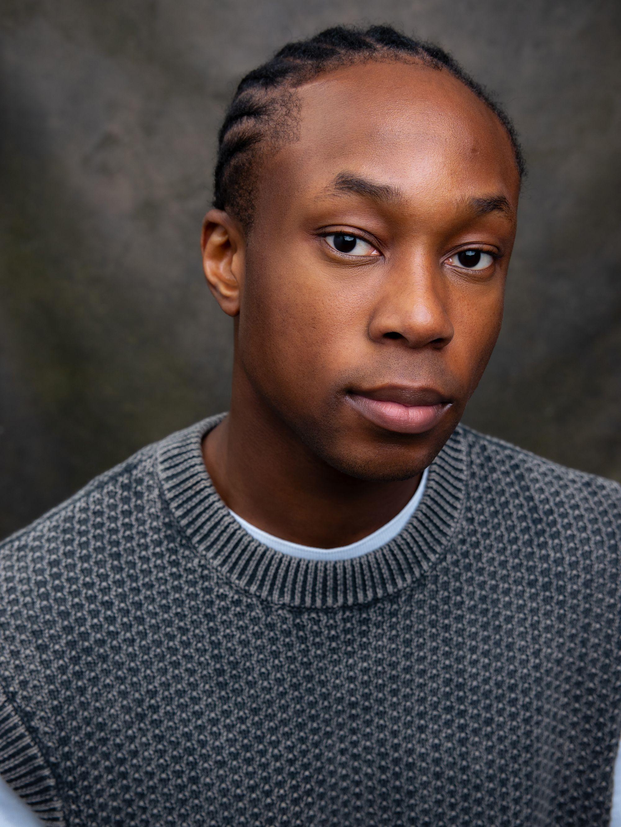 actor Raphel Famotibe large photo