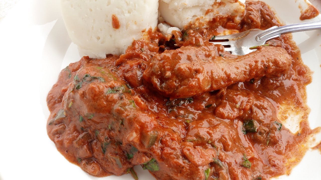 The best CHICKEN PEANUT SAUCE recipe.Enkoko mu biyebwa. background