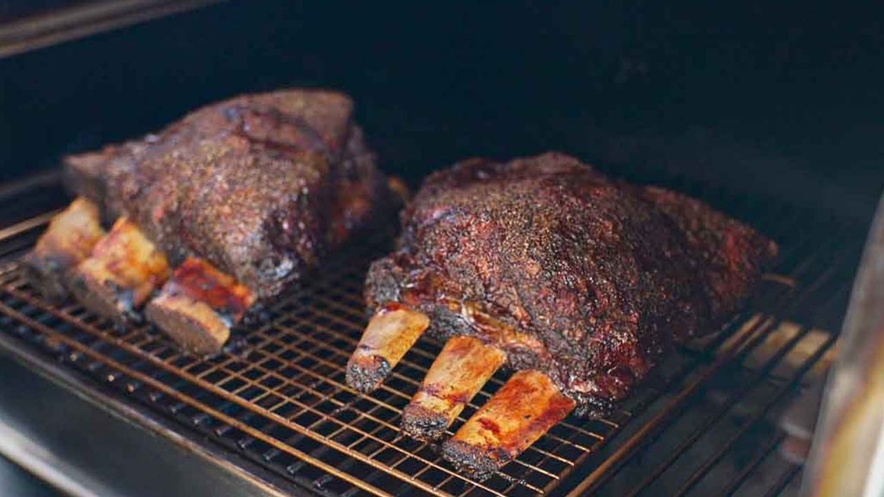 AB’s Secret to Perfectly Smoked Dino Ribs background