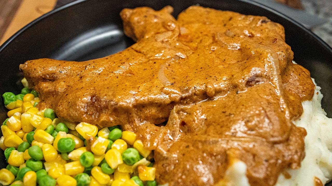 Smothered Pork Chops Like Grandma Used to Make backdrop