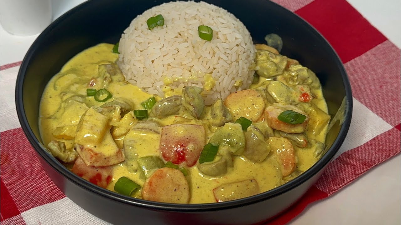 Coconut Gizzard Sauce . Best sauce ever !. Pairs well with jollof rice, white rice & fried rice . background