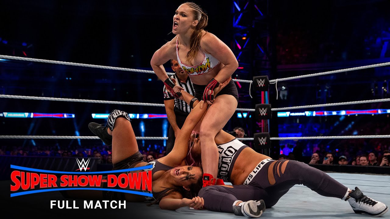 FULL MATCH - Ronda Rousey & The Bella Twins vs. The Riott Squad: WWE Super Show-Down 2018 poster - similar to UFC 275: Weili vs Jedrzejczyk Highlights