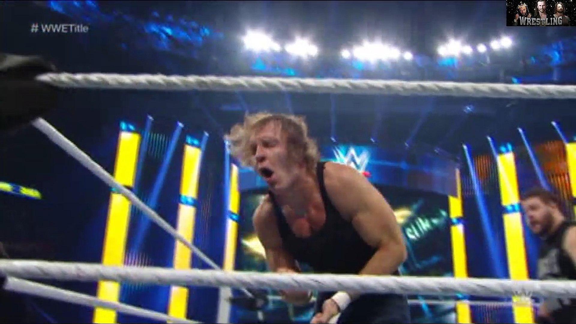 Dean Ambrose derrotó a Kevin Owens background