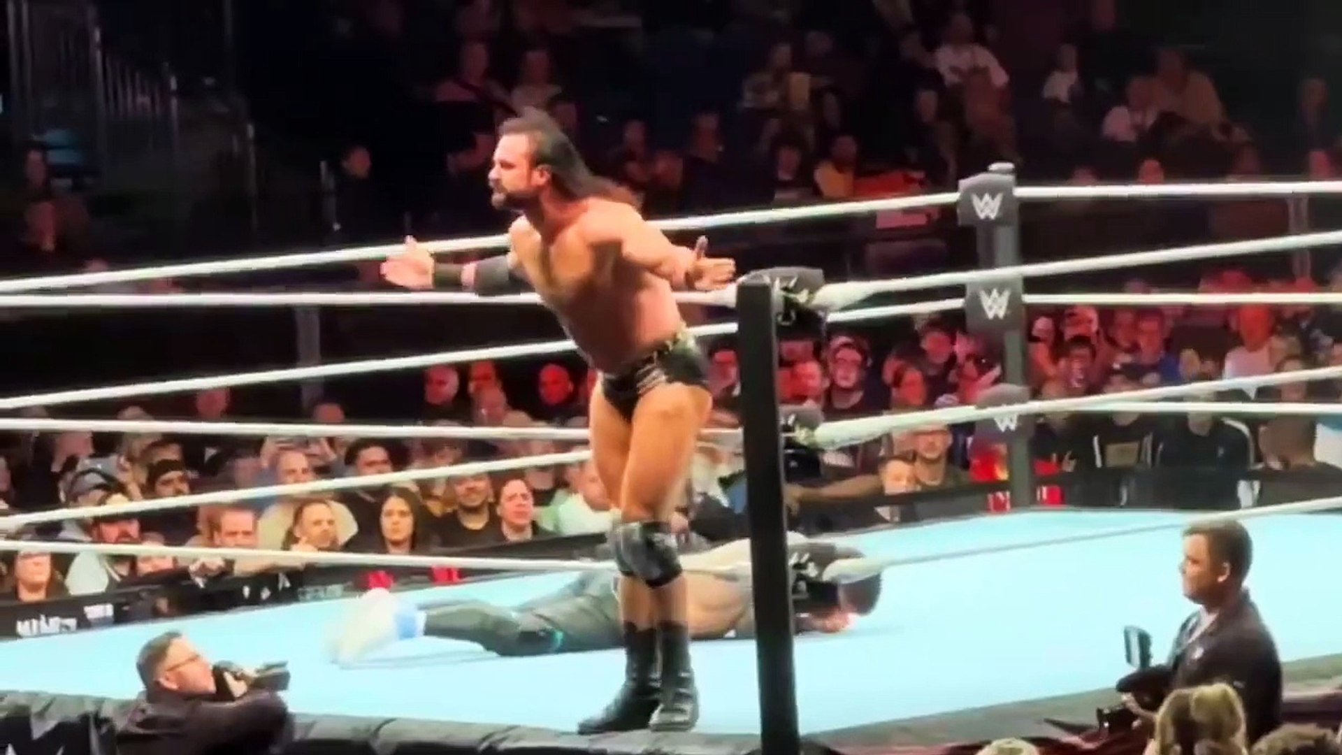 ROMAN REIGNS VS DREW MCINTYRE AT WWE LIVE EVENT backdrop