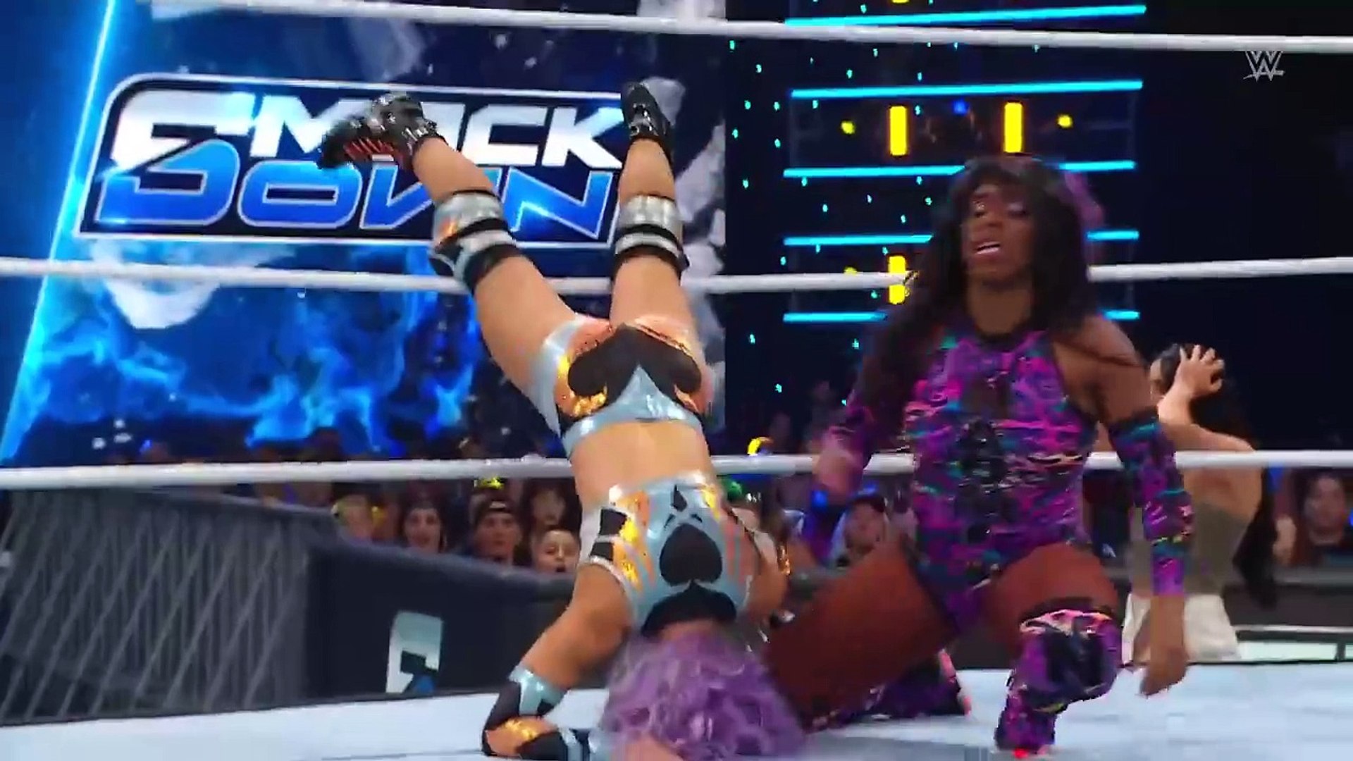 Naomi w/ Bailey vs Candice LeRae background