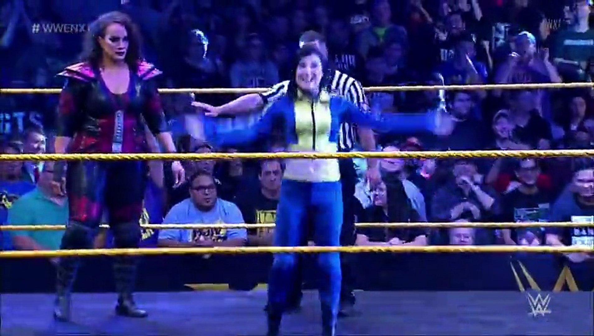 Nia Jax vs Blue Pants background