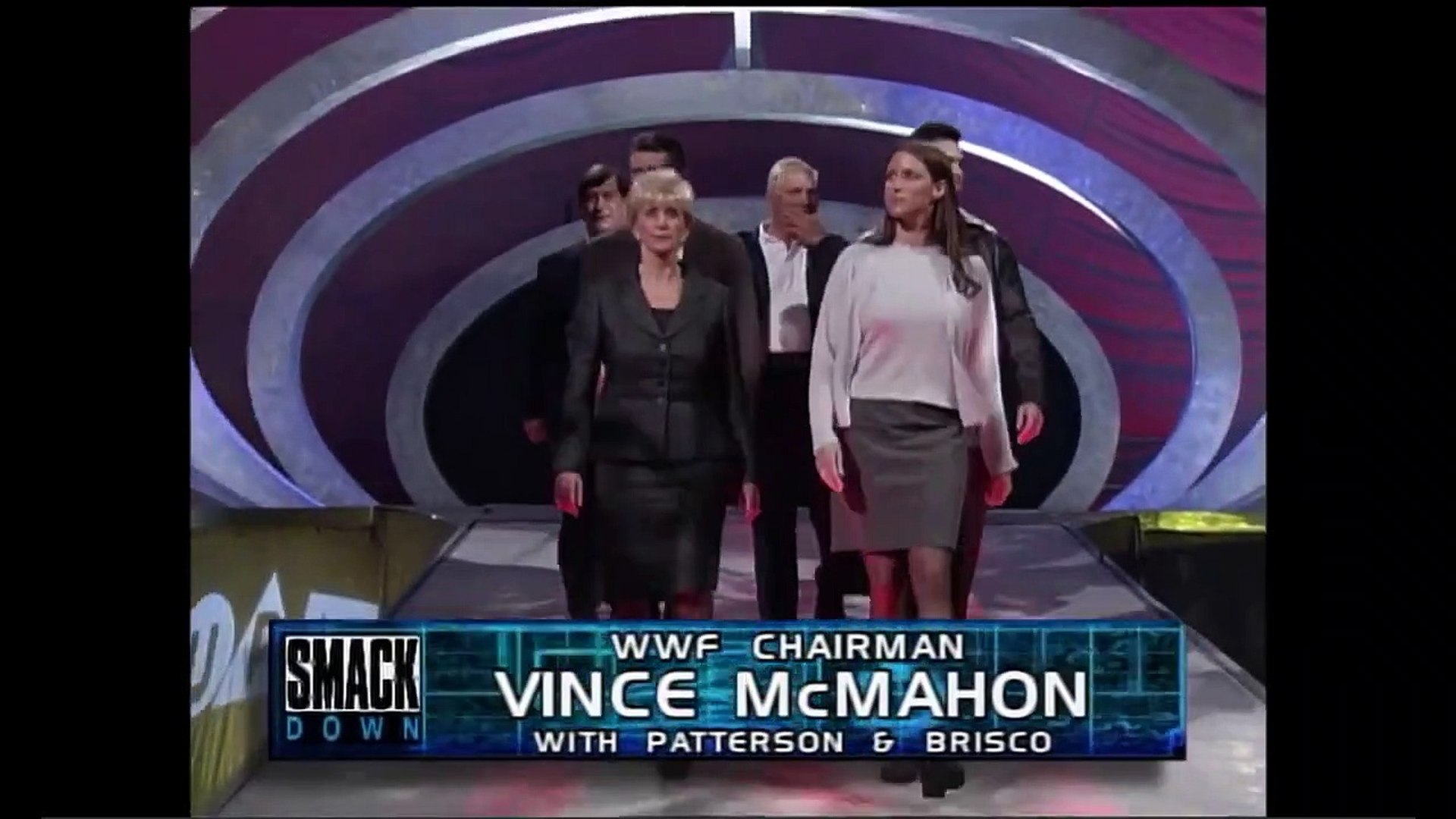 Vince McMahon & Triple H signs the contract for Armageddon