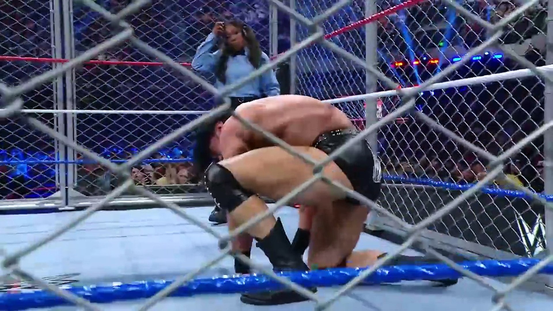 WWE MAIN EVENT DREW MCYNTYRE VS DAMIEN PRIEST STEEL CAGE MATCH background