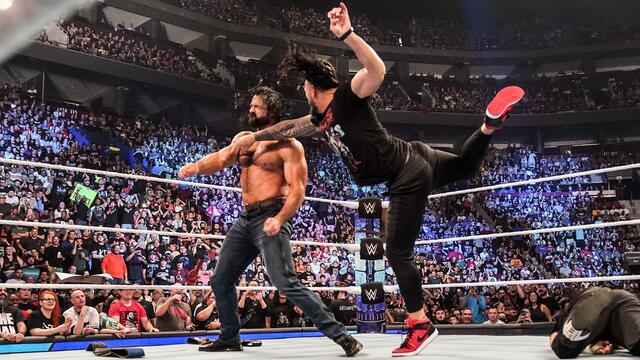 Roman Reigns brawls with Drew McIntyre ahead of WWE Clash at the Castle: SmackDown, Aug. 19, 2022 poster — similar to UFC Vegas 8 Weigh-Ins: Anthony Smith vs Aleksandar Rakic