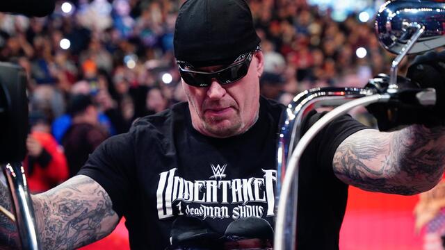 Undertaker returns as the American Badass background