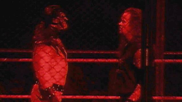 The monstrous Kane comes face-to-face with Undertaker, costing him a Hell in a Cell Match: Kane A&E Biography: Legends sneak peek background