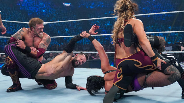Edge & Beth Phoenix educate Rhea Ripley & Finn Bálor with double Edgecators: WWE Elimination Chamber 2023 highlights background
