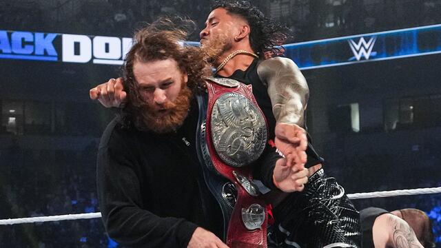 The Usos hijack the Reigns & Sikoa face-to-face with Owens & Zayn background