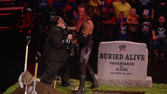 Undertaker vs. Kane: WWE Bragging Rights 2010 - World Heavyweight Championship Buried Alive Match backdrop